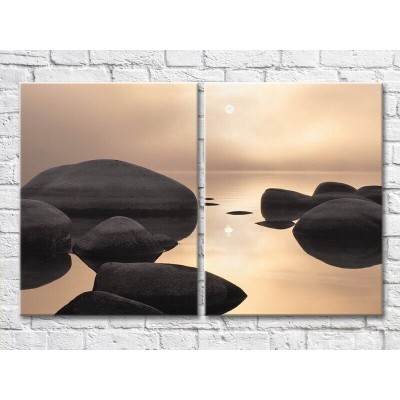 Pictură ArtPoster Black boulders in the sea (3453819)