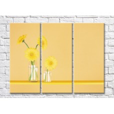 Pictură Rainbow Yellow gerberas in glassware on a beige background (500283)